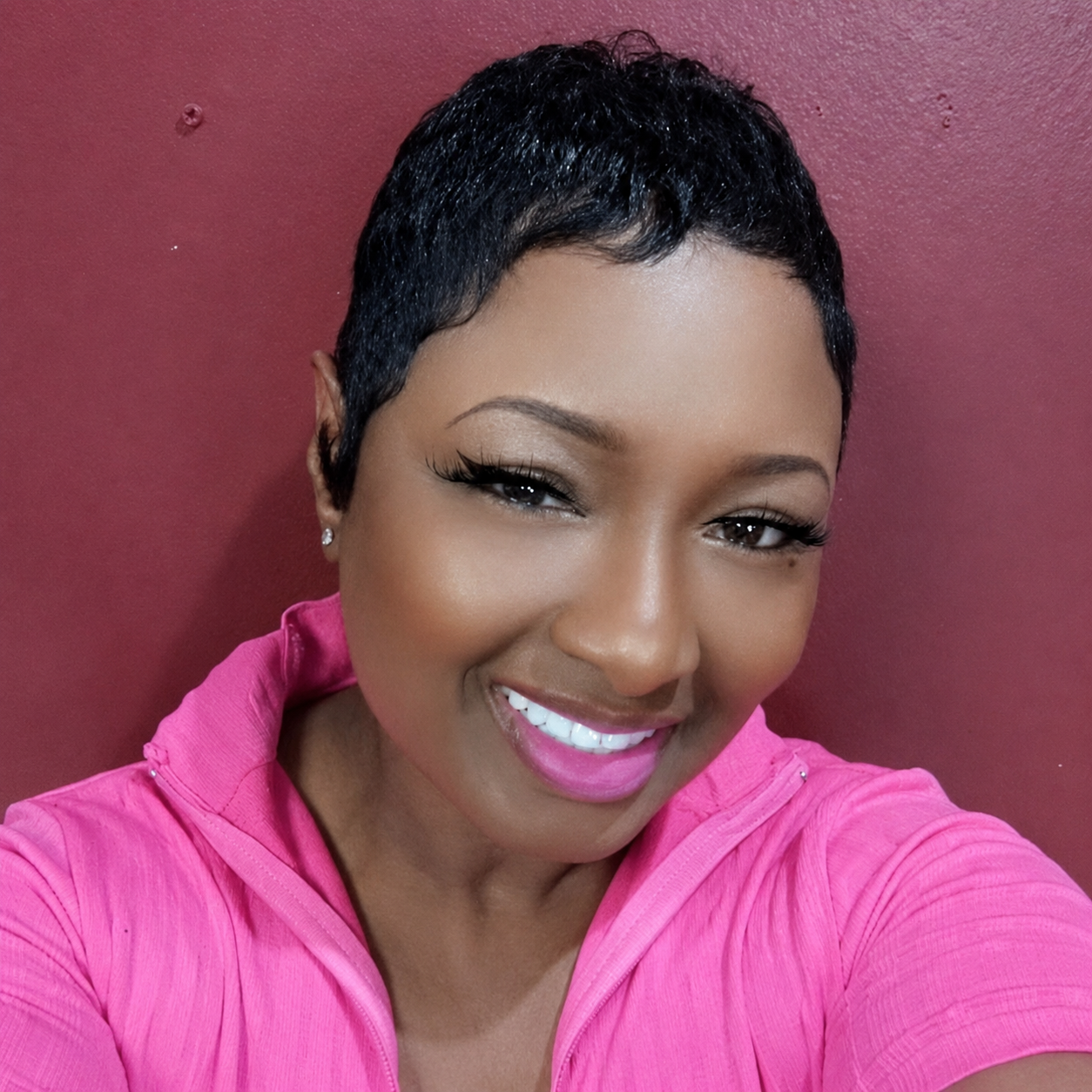 Ms. Keisha, owner and lead artist of Hotlooks Hair and Makeup Salon